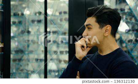 Man thinking and looking out of the window Man thinking and looking out of the window 136312130