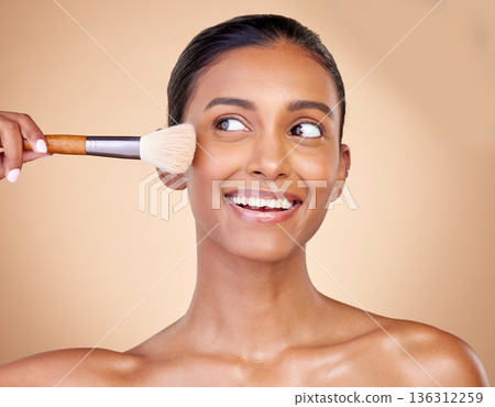 Beauty, makeup and smile with woman and brush in studio for facial, foundation and self care. Cosmetics, product and tools with face of model on brown background for glow, skincare and dermatology Beauty, makeup and smile with woman and brush in studio for facial, foundation and self care. Cosmetics, product and tools with face of model on brown background for glow, skincare and dermatology 136312259