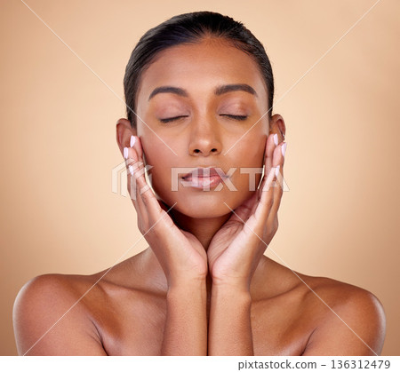Relax, skincare or woman with wellness, beauty or natural facial glow with dermatology cosmetics in studio. Eyes closed, background or face of Indian girl model resting with shine or self love Relax, skincare or woman with wellness, beauty or natural facial glow with dermatology cosmetics in studio. Eyes closed, background or face of Indian girl model resting with shine or self love 136312479