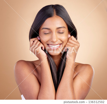 Beauty, skincare and hair with face of woman in studio for shampoo, salon and hairstyle. Smile, cosmetics and self care with face of female model on brown background for makeup, glow and spa Beauty, skincare and hair with face of woman in studio for shampoo, salon and hairstyle. Smile, cosmetics and self care with face of female model on brown background for makeup, glow and spa 136312502