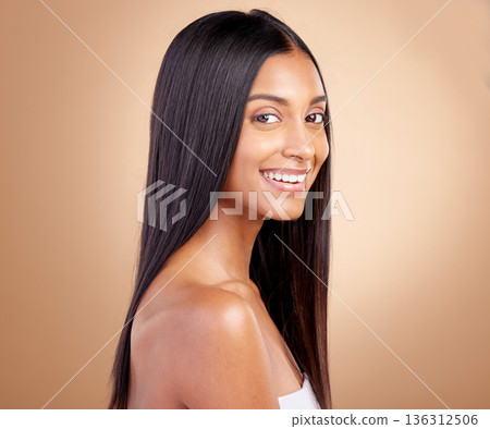 Beauty, smile and hair with portrait of woman in studio for shampoo, salon and hairstyle. Skincare, cosmetics and self care with face of female model on brown background for makeup, glow and spa Beauty, smile and hair with portrait of woman in studio for shampoo, salon and hairstyle. Skincare, cosmetics and self care with face of female model on brown background for makeup, glow and spa 136312506