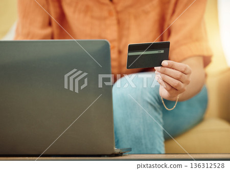 Credit card, hands and laptop for online shopping in home, digital payment and fintech password for ecommerce sales. Closeup of person, computer and internet banking for budget of financial account Credit card, hands and laptop for online shopping in home, digital payment and fintech password for ecommerce sales. Closeup of person, computer and internet banking for budget of financial account 136312528