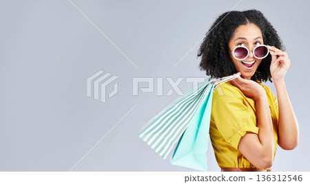 Shopping, bag and woman excited for retail sale, promotion or happy for discount on studio, mockup or grey background. Wow, customer and girl to shop for fashion or sales on luxury clothing Shopping, bag and woman excited for retail sale, promotion or happy for discount on studio, mockup or grey background. Wow, customer and girl to shop for fashion or sales on luxury clothing 136312546