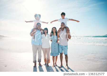 Holiday, beach and portrait of happy family bonding together at the sea or ocean for love, care and happiness. Travel, sun and parents with children or kids and grandparents on a vacation for freedom Holiday, beach and portrait of happy family bonding together at the sea or ocean for love, care and happiness. Travel, sun and parents with children or kids and grandparents on a vacation for freedom 136312577