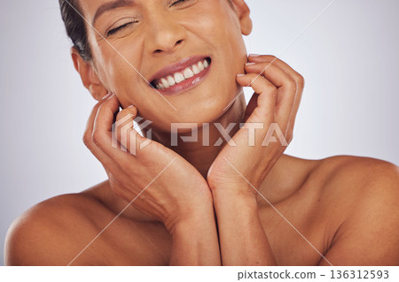 Self care, dermatology and mature woman with skincare, makeup and aesthetic on a studio background. Female person, face or model with luxury cosmetics, natural beauty or wellness with a glow or smile Self care, dermatology and mature woman with skincare, makeup and aesthetic on a studio background. Female person, face or model with luxury cosmetics, natural beauty or wellness with a glow or smile 136312593