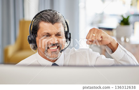 Call centre, happy and a man at computer to celebrate success, achievement or bonus win. A mature male consultant or agent with a fist for customer service, help desk and crm or telemarketing target 136312638