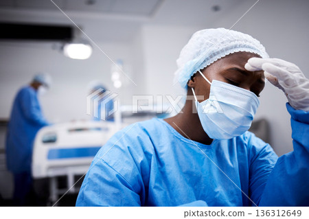 Stress, black woman and doctor with depression, anxiety and mental health issue with surgery loss. Female person, employee and medical professional with burnout, sad and anxious with mistake or grief 136312649