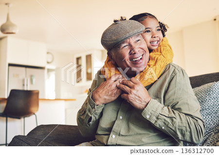 Hug, grandparent playing or happy child in family home on sofa with love or care bonding together. Piggyback, living room couch or senior grandfather with young girl, smile or kid to relax in house Hug, grandparent playing or happy child in family home on sofa with love or care bonding together. Piggyback, living room couch or senior grandfather with young girl, smile or kid to relax in house 136312700