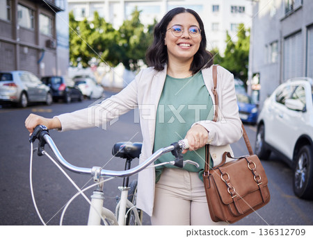 Business woman, bike and thinking in street, city and sustainable travel with smile, ideas and accountability. Young entrepreneur, employee and cycling for ecology, climate change or transport in cbd 136312709