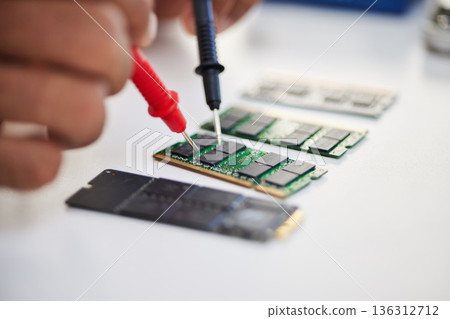Hands, motherboard and engineer solder circuit board for technology, electrical hardware or CPU microchip. Closeup, technician and iron welding tools for IT maintenance, upgrade or test semiconductor Hands, motherboard and engineer solder circuit board for technology, electrical hardware or CPU microchip. Closeup, technician and iron welding tools for IT maintenance, upgrade or test semiconductor 136312712