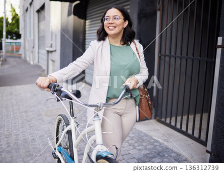Business, woman and walking with bicycle in outdoor with smile for travel to work with marketer. Happy, business and female person with transportation for cycling to commute in city with bag for job. Business, woman and walking with bicycle in outdoor with smile for travel to work with marketer. Happy, business and female person with transportation for cycling to commute in city with bag for job. 136312739