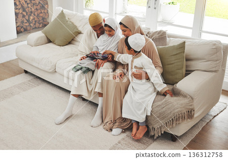Family house, children or Muslim parents with tablet for elearning, Islamic info or studying in Allah or God. Child development, dad or Arab mom with young kids reading online ebook on social media Family house, children or Muslim parents with tablet for elearning, Islamic info or studying in Allah or God. Child development, dad or Arab mom with young kids reading online ebook on social media 136312758