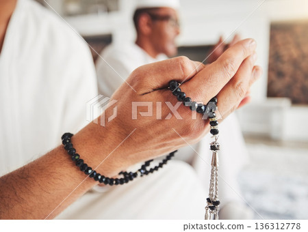 Prayer beads, Muslim person hands and Islamic faith, worship and trust in God with peace and religion. Devotion, spiritual and Islam with gratitude, respect and closeup with praying in the Mosque Prayer beads, Muslim person hands and Islamic faith, worship and trust in God with peace and religion. Devotion, spiritual and Islam with gratitude, respect and closeup with praying in the Mosque 136312778