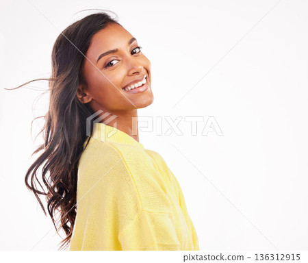 Hair, wind and Indian woman in studio portrait with white background for fashion, makeup or confidence with natural beauty. Face, smile and young model with freedom and happiness with space or mockup Hair, wind and Indian woman in studio portrait with white background for fashion, makeup or confidence with natural beauty. Face, smile and young model with freedom and happiness with space or mockup 136312915