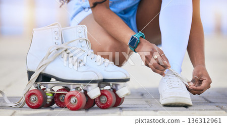 Hands, roller skates and tie shoes on street to start exercise, workout or training outdoor. Skating, person and tying sneakers to get ready for sports on road to travel, journey and fitness practice Hands, roller skates and tie shoes on street to start exercise, workout or training outdoor. Skating, person and tying sneakers to get ready for sports on road to travel, journey and fitness practice 136312961