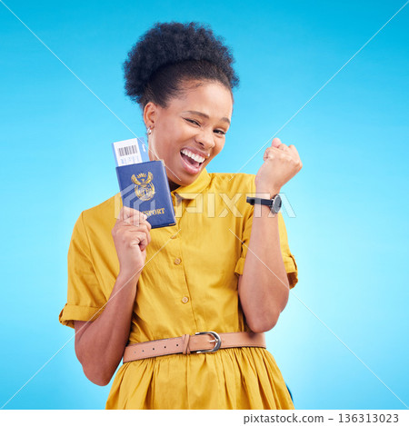 African woman, passport and celebration in studio, smile or compliance for id paperwork by blue background. Happy student girl, winner and travel opportunity with immigration document in South Africa 136313023