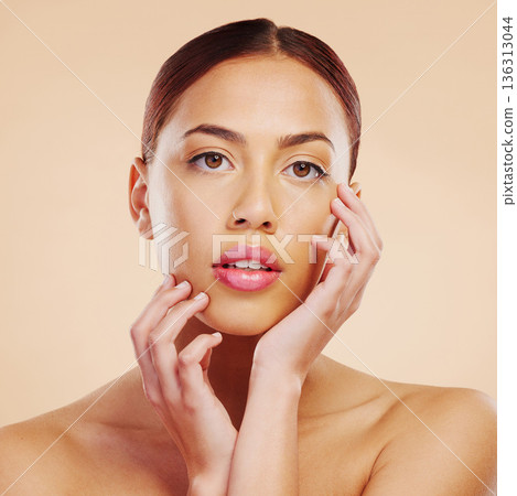 Portrait, skincare and woman with cosmetics, dermatology and luxury against a brown studio background. Face detox, female person or model with makeup, aesthetic or wellness with health, glow or shine 136313044