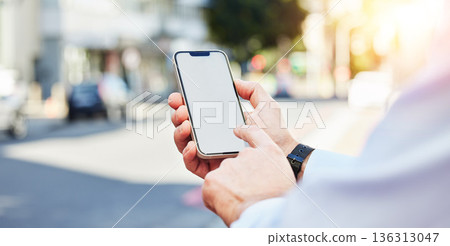 Phone, mockup and hands in a city for travel with space for advertising, contact or information. Smartphone, screen and person online for location, directions or guide, app or navigation in a street 136313047