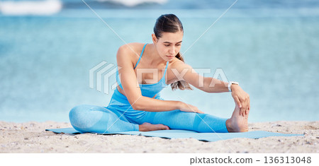 Stretching legs, yoga and woman by beach on sports mat for wellness, healthy body and balance. Performance, nature and female person outdoors for exercise, training and workout by sea for pilates Stretching legs, yoga and woman by beach on sports mat for wellness, healthy body and balance. Performance, nature and female person outdoors for exercise, training and workout by sea for pilates 136313048