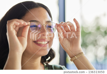 Woman, glasses and thinking with eyes, optometry and health with smile, choice and fashion in store. Girl, frame and lens for wellness, vision and happy for eyesight, decision and customer experience 136313050