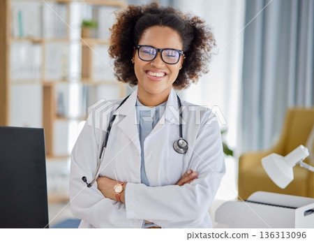 Black woman, portrait and medical doctor with arms crossed for consultation, hospital support and help. Happy confident female therapist ready for professional healthcare, clinic consulting and trust Black woman, portrait and medical doctor with arms crossed for consultation, hospital support and help. Happy confident female therapist ready for professional healthcare, clinic consulting and trust 136313096