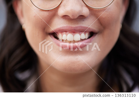 Teeth, dental hygiene of a woman with a smile on face for happiness, motivation and positive mindset. Closeup, zoom and mouth of a happy female person with cosmetics, confidence and wellness 136313110