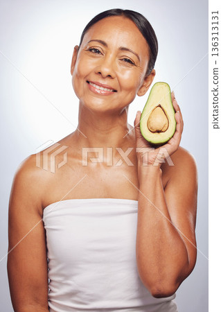 Skincare, portrait and senior woman with avocado in studio isolated on a white background. Face, natural fruit and happy model with food for organic nutrition, healthy diet and omega 3 for anti aging Skincare, portrait and senior woman with avocado in studio isolated on a white background. Face, natural fruit and happy model with food for organic nutrition, healthy diet and omega 3 for anti aging 136313131