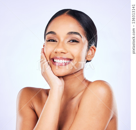 Portrait, aesthetic and skincare with a model woman in studio on a white background for natural wellness. Face, smile and beauty with a happy young person posing for luxury cosmetics or dermatology Portrait, aesthetic and skincare with a model woman in studio on a white background for natural wellness. Face, smile and beauty with a happy young person posing for luxury cosmetics or dermatology 136313141