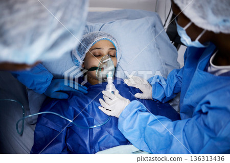 Doctor, hospital bed or woman with an oxygen mask, respiratory or operation for healthcare recovery. Medical surgeon, anesthesia or sick patient with breathing equipment for ventilation in emergency 136313436