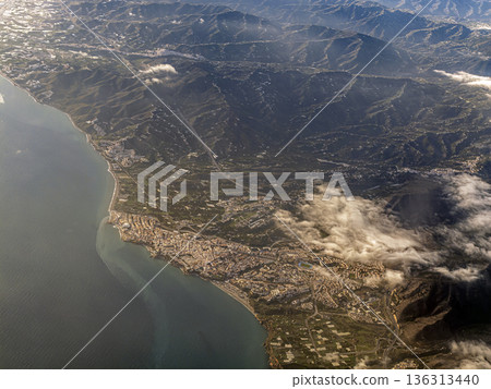 Aerial View Of Coastline Mountains And Coastal Towns From Above At Sunset Aerial View Of Coastline Mountains And Coastal Towns From Above At Sunset 136313440