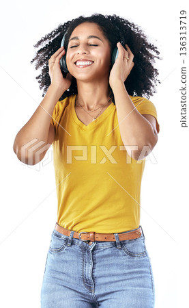 Music, excited and a happy woman with headphones in studio streaming audio, sound or radio. Energy, podcast and a young african person isolated on a white background listening to fun song to relax Music, excited and a happy woman with headphones in studio streaming audio, sound or radio. Energy, podcast and a young african person isolated on a white background listening to fun song to relax 136313719