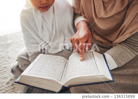 Quran, Muslim child or parent hands reading for learning, Islamic knowledge and faith in Allah, god or culture. Spiritual books, home closeup or Arab person teaching kid worship, prayer or gratitude 136313899