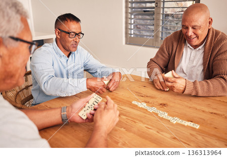 Senior men, friends and table for domino game, contest and happy together with strategy in retirement. People, elderly group and relax with focus, competition and mindset for winning, fun and house Senior men, friends and table for domino game, contest and happy together with strategy in retirement. People, elderly group and relax with focus, competition and mindset for winning, fun and house 136313964