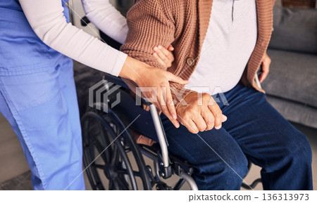 Hands, nurse and patient in wheelchair for support, medical service and physical therapy in retirement home. Closeup of caregiver helping elderly person with disability, healthcare and nursing aid 136313973