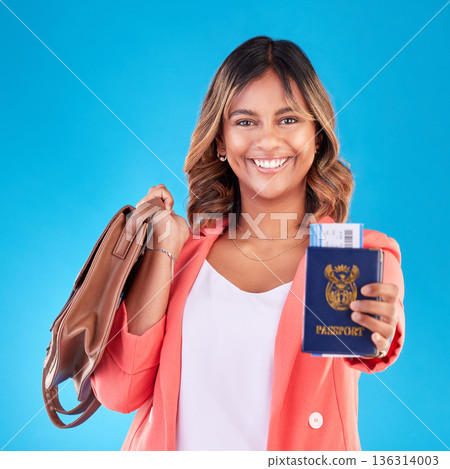 Passport, bag and woman in portrait for travel opportunity, international holiday or immigration in studio. Identity documents, flight ticket and happy face of young african person on blue background Passport, bag and woman in portrait for travel opportunity, international holiday or immigration in studio. Identity documents, flight ticket and happy face of young african person on blue background 136314003