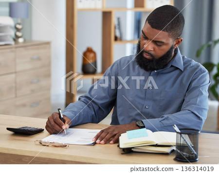 Black man, planning finance or working on budget in home or remote work, accounting or writing on documents or paper. Tax, audit or businessman in office with financial strategy or accountant Black man, planning finance or working on budget in home or remote work, accounting or writing on documents or paper. Tax, audit or businessman in office with financial strategy or accountant 136314019