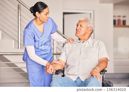 Happy woman, nurse and talking to patient in wheelchair for support, medical service and physical therapy in retirement home. Caregiver helping elderly person with disability, healthcare and nursing 136314020
