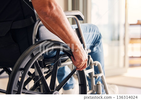 Man, hands and wheelchair for support, hope or travel in healthcare or medicare at home. Closeup of male or person with a disability moving on chair for mobility, surgery or wellness in the house Man, hands and wheelchair for support, hope or travel in healthcare or medicare at home. Closeup of male or person with a disability moving on chair for mobility, surgery or wellness in the house 136314024