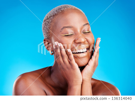 Face makeup, smile and happy black woman with facial application, aesthetic cosmetics and skincare hydration glow. Beauty eyeliner, collagen shine and African studio person on blue background. Face makeup, smile and happy black woman with facial application, aesthetic cosmetics and skincare hydration glow. Beauty eyeliner, collagen shine and African studio person on blue background. 136314040
