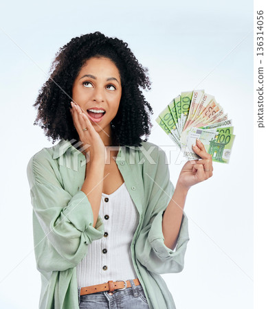 Woman, cash fan and thinking in studio for prize, profit or bonus from investing, savings or wow by white background. Isolated African girl, student and surprise for money, win and gambling in lotto Woman, cash fan and thinking in studio for prize, profit or bonus from investing, savings or wow by white background. Isolated African girl, student and surprise for money, win and gambling in lotto 136314056