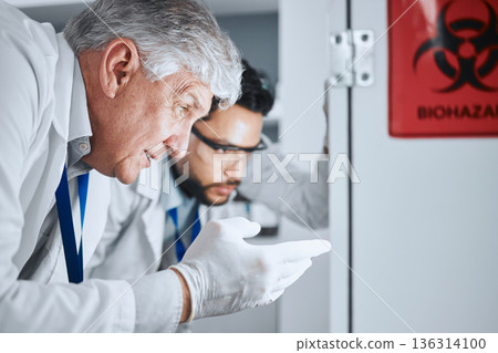 Senior scientist, team and pointing in lab for analysis, experiment results and partnership for virus growth. Science men, teamwork and study for medical research with hazardous bacteria in hospital Senior scientist, team and pointing in lab for analysis, experiment results and partnership for virus growth. Science men, teamwork and study for medical research with hazardous bacteria in hospital 136314100