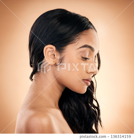 Profile, texture and woman with hair care, salon treatment and wellness against a brown studio background. Female person, girl and model with ideas, aesthetic and skincare with growth and self care 136314159
