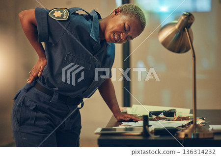 Police, woman and back pain in a cop station with spine problem and injury from career. Female person, security guard and inflammation with backache from arrest accident at high risk job with stress Police, woman and back pain in a cop station with spine problem and injury from career. Female person, security guard and inflammation with backache from arrest accident at high risk job with stress 136314232