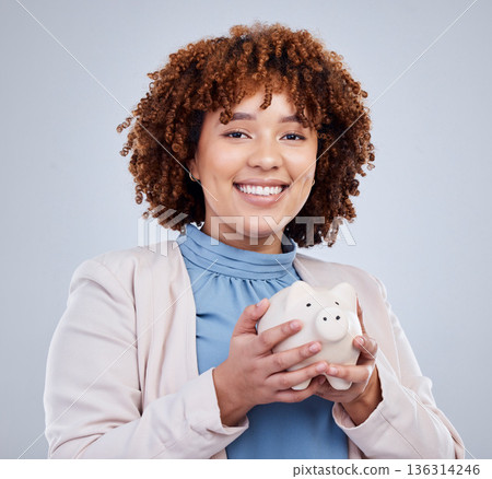 Portrait, piggy bank and happy woman in studio for savings, growth and budget on white background. Money, box and face of female person with investment success, smile and future financial freedom 136314246