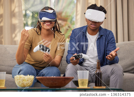 Man, woman and virtual reality video game and challenge, competition winner and futuristic gaming date at home. Metaverse, fist pump and digital world, couple in living room with 3D games and tech 136314375