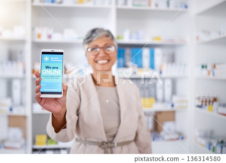 Pharmacy, contact and mobile for medical with doctor in closeup with internet or blurr background. Pharmacist, woman and hand with phone screen for online in portrait at drugstore with feedback. Pharmacy, contact and mobile for medical with doctor in closeup with internet or blurr background. Pharmacist, woman and hand with phone screen for online in portrait at drugstore with feedback. 136314580