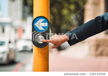 Woman, hands and arrow button on road in city for pedestrian crossing signal in safe travel outdoors. Female person touching sign, symbol or crosswalk by robot for safety on street in Cape Town 136314594