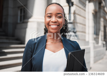 Happy black woman, lawyer and portrait smile in confidence for career ambition in the city. Face of African female person or business attorney in happiness or pride for job opportunity in urban town Happy black woman, lawyer and portrait smile in confidence for career ambition in the city. Face of African female person or business attorney in happiness or pride for job opportunity in urban town 136314609
