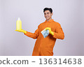 Happy male construction worker holding glue and cleaning tools 136314638