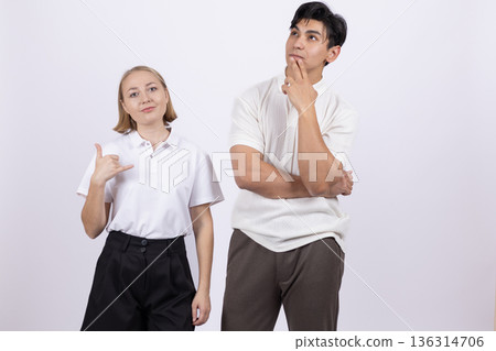 Students thinking and looking up in school uniform 136314706